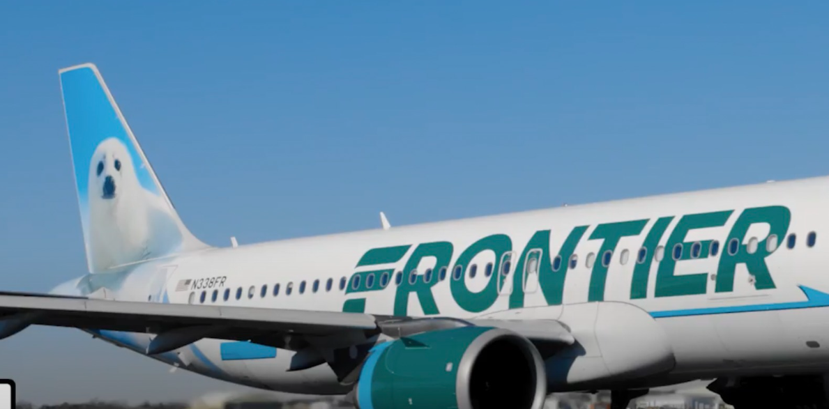 A frontier airplane with a seal on the wing